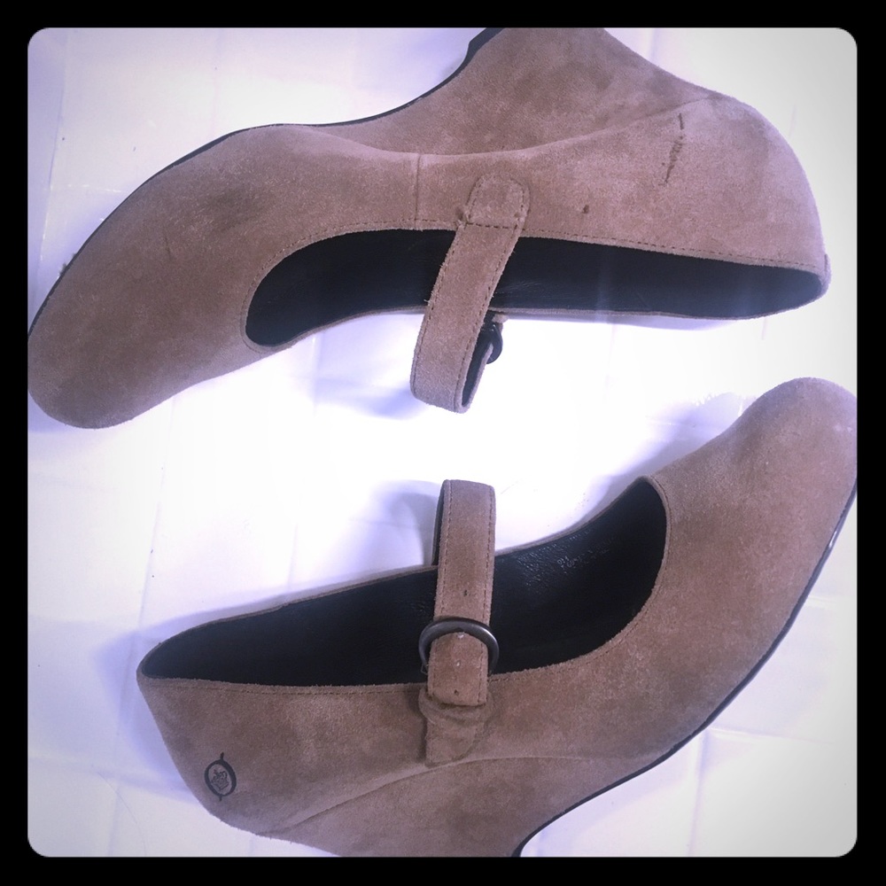 born. leather upper. wedge
